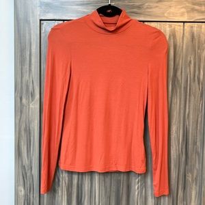 Shein ladies turtleneck top in rust color.  Size Medium with long sleeves.